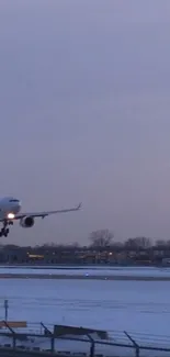 Commercial airplane taking off during dusk with a snowy runway backdrop.