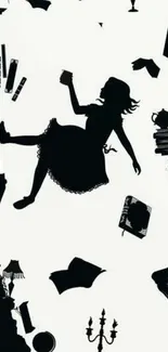 Silhouette of Alice falling with whimsical objects around.