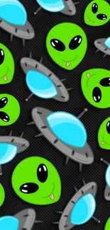 Green alien faces with UFOs on wallpaper.