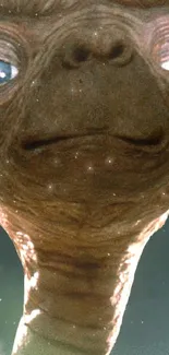 Close-up of a classic alien creature in a mobile wallpaper.