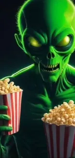 Neon green alien holding popcorn cups.