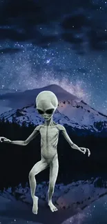 Alien figure beneath starry night sky with mountain backdrop.