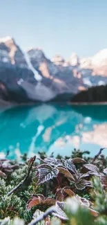 Snow-capped mountains and turquoise lake reflection scenery.