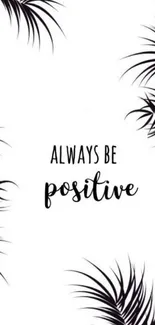 Always be positive quote with black palm leaves on white background.