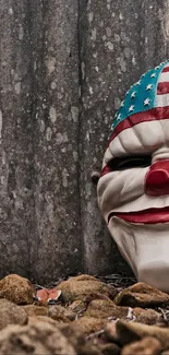 American flag design mask on rustic stone backdrop.