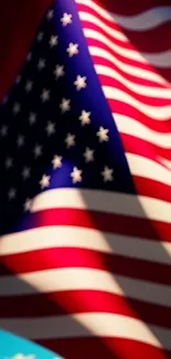 Waving American flag with stars and stripes, featuring vibrant red, white, and blue colors.