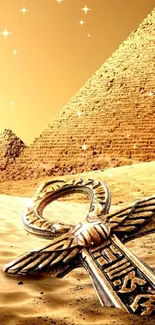 Golden sandy pyramids with an ankh symbol in the foreground.