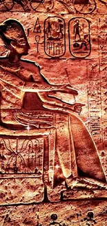 Ancient Egyptian stone art with hieroglyphs and figures on a textured background.