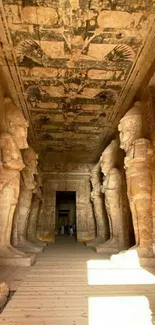 Ancient Egyptian temple interior with stone statues.