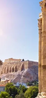 Sunlit Greek ruins with ancient columns and temple in background.