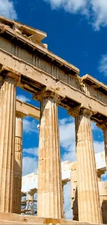 Ancient Parthenon against a bright blue sky.