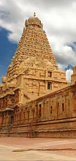 Ancient Indian temple under dramatic cloudy sky