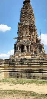 Ancient temple with blue sky background and fluffy clouds.