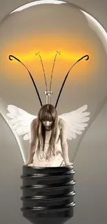 An angel figure inside a light bulb on a gray background.