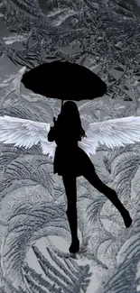 Silhouette with wings on a textured gray background.