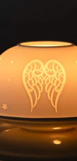 Serene angel wings lamp casting a warm glow.