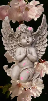 Beautiful angel statue with cherry blossoms in the background, perfect for mobile wallpaper.