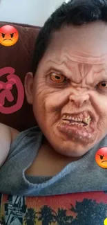 Humorous angry face filter with emojis on a phone wallpaper.