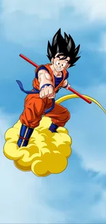 Goku flying on a cloud with a blue sky backdrop in Dragon Ball wallpaper.