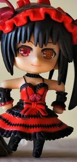 Anime figurine with red and black dress on mobile wallpaper.