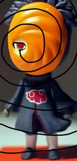 Anime figure with orange spiral mask and red emblem.