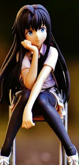 Anime figure with dark hair seated in a contemplative pose on a chair.