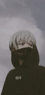 Anime figure in a dark hoodie against a grey, cloudy sky.