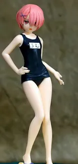 Anime figure with pink hair in black swimsuit.