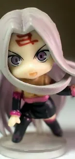 Anime figurine with purple hair and red symbol