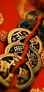 Antique coins with red background and intricate designs.