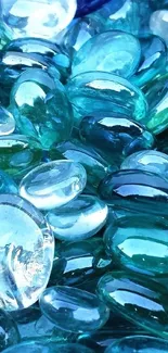 Aqua blue glass stones with vibrant hues creating a calming visual effect.