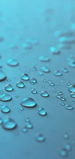 Aqua droplets on a smooth surface, creating a calm and refreshing wallpaper.