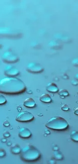 Aqua blue wallpaper with water droplets.