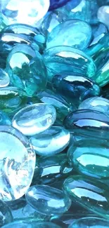 Aqua blue glass stones with a smooth texture create a calming and elegant phone wallpaper.