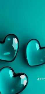 Aqua hearts on a turquoise background with glossy finish.