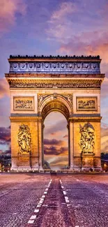 Arc de Triomphe at sunset with vibrant sky.