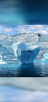 Majestic iceberg floating in Arctic landscape with snowy mountains.