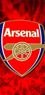 Arsenal logo with red fiery background wallpaper.