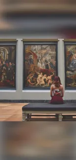 Woman admiring paintings in art gallery.