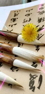 Beige paper with calligraphy and brushes on wooden table.