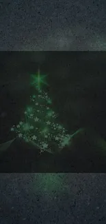 Green starry Christmas tree on a dark background wallpaper.