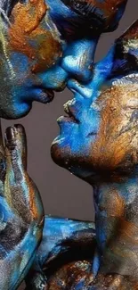 Vibrant blue and gold painted couple portrait.