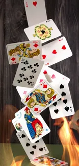 Artistic stack of playing cards with a wooden background.