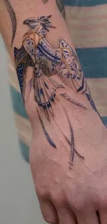 Artistic tattoo design on an arm, featuring elaborate linework.