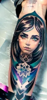 Vibrant tattoo of woman's face on an arm.