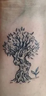 Detailed tree tattoo design on arm, perfect for wallpaper.