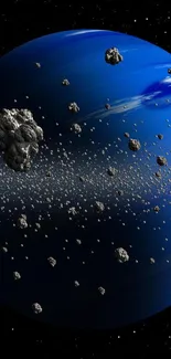 Blue planet and asteroid belt in space wallpaper.