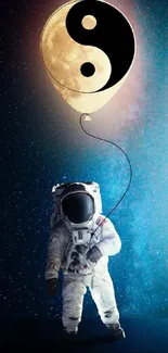 Astronaut floating with Yin Yang balloon under the stars.