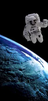 Astronaut floating in space above Earth, cosmic view.