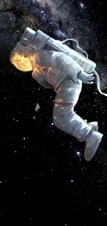 Astronaut floating in space with a starry background.